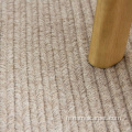 Tapis tressé en laine naturelle de couleur beige d'ivoire blanc